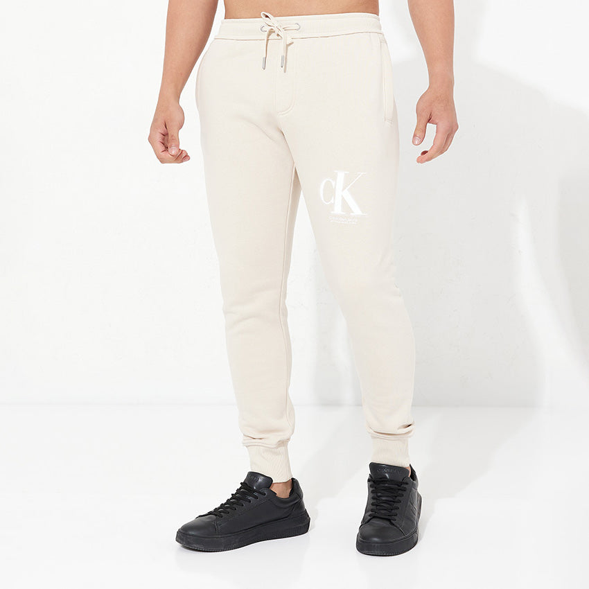 Monogram Spray Drawstring Waist Joggers - Beige